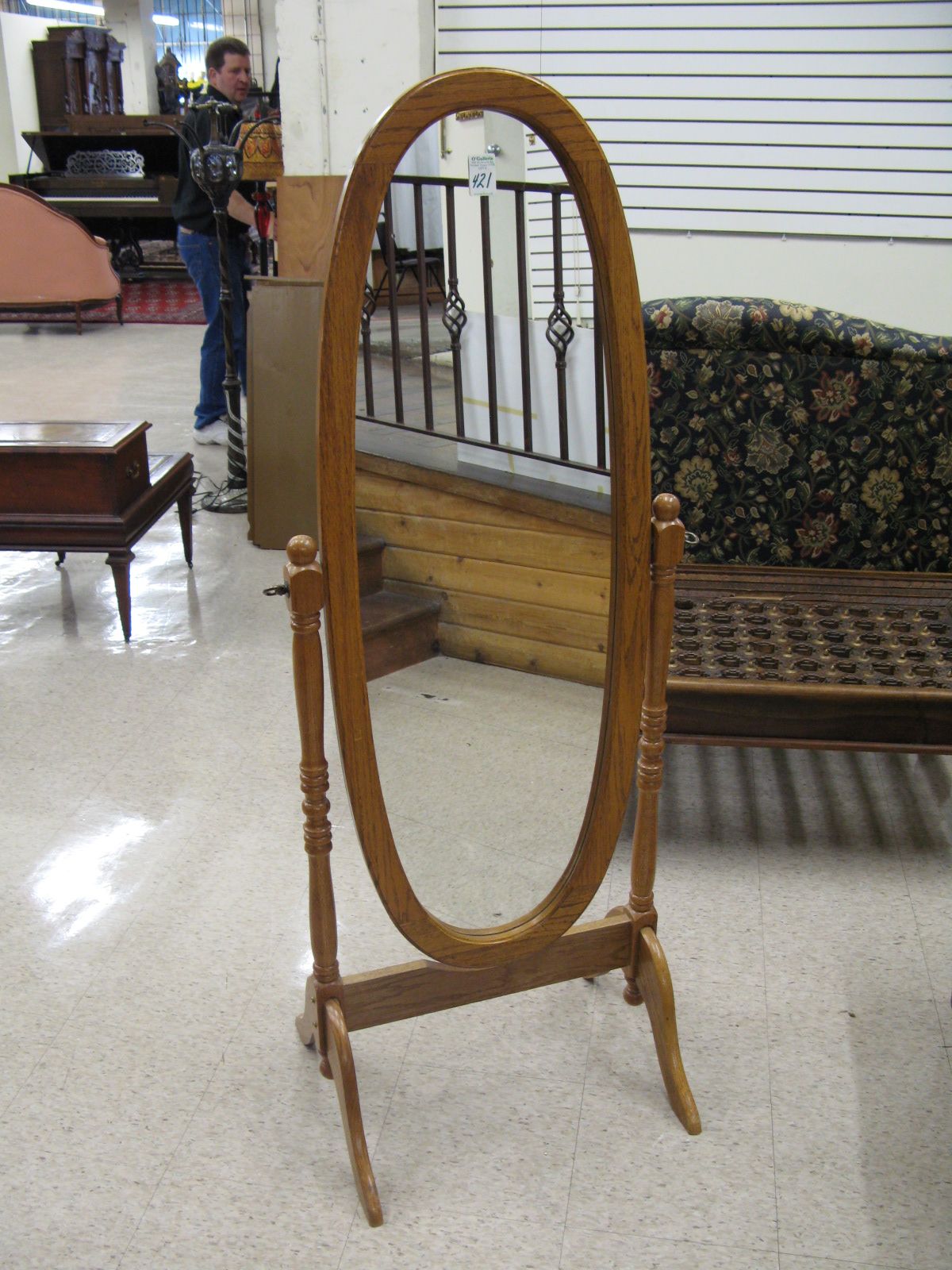 Appraisal: AN OAK CHEVAL MIRROR American antique reproduction having an oval