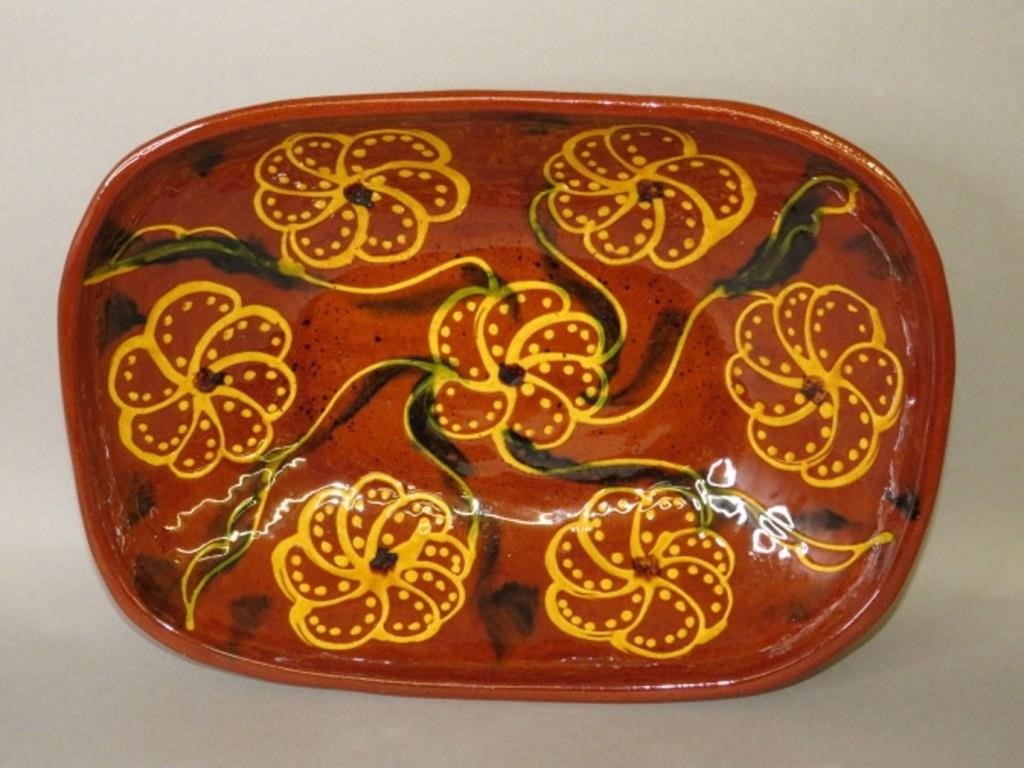 Appraisal: FOLK ART THREE-COLOR SLIP DECORATED LOAF DISH BY Lca dated