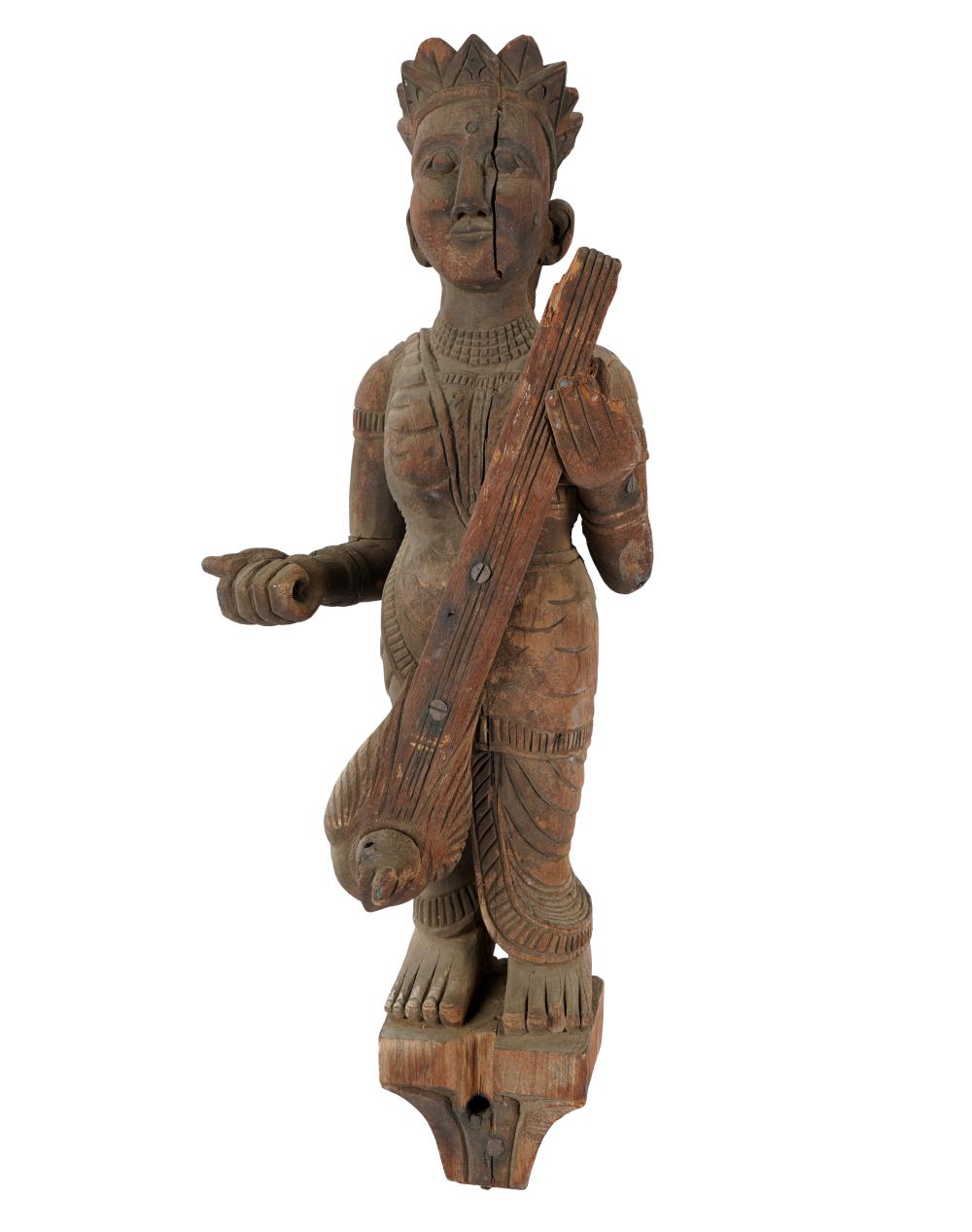 Appraisal: INDONESIAN CARVED WOOD FIGUREwith later-added metal hooks to back inches