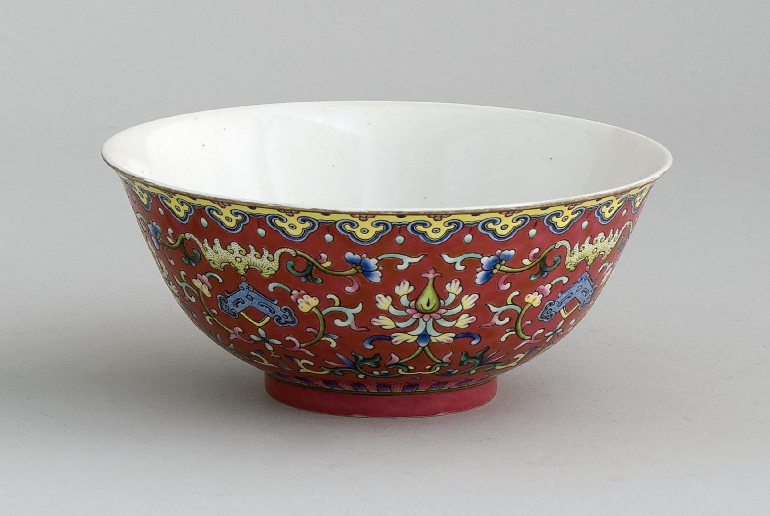 Appraisal: POLYCHROME PORCELAIN BOWL In bell form with pahua design on