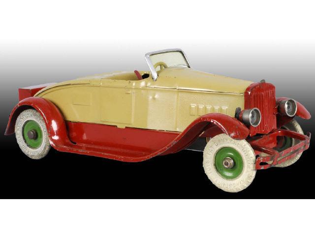 Appraisal: Pressed Steel Tan Red Kingsbury Toy Convertible Description Circa Working