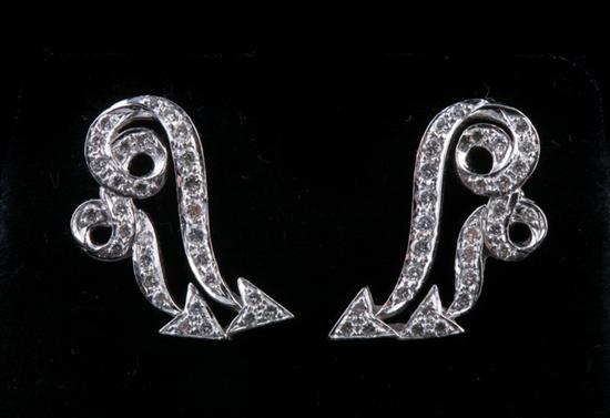 Appraisal: PAIR K WHITE GOLD AND DIAMOND RETRO EARRINGS Double scrolling