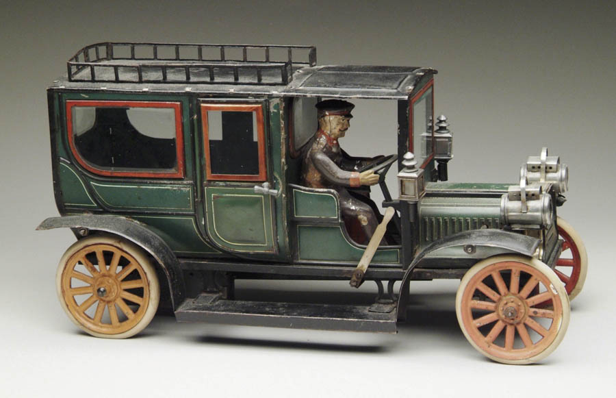 Appraisal: LARGE CARETTE LIMOUSINE Impressive green lithographed car with black enameled