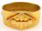 Appraisal: A yellow metal tests carat gold bangle with applied geometric