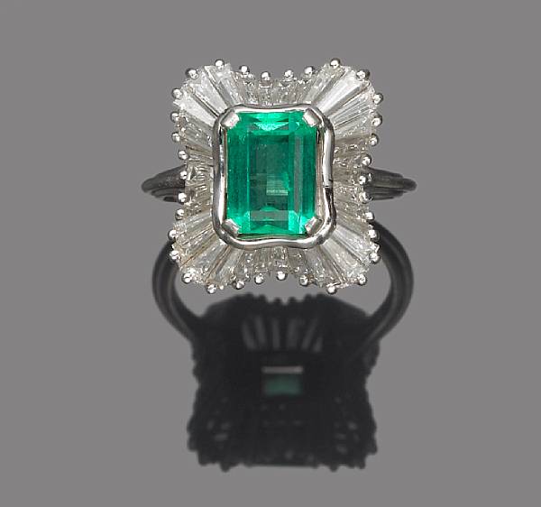 Appraisal: An emerald and diamond ballerina ring centering a rectangular-cut emerald