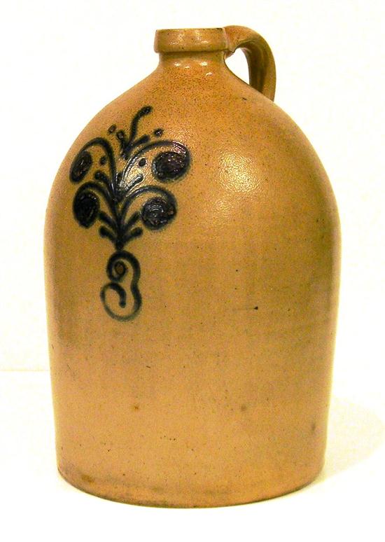 Appraisal: Stoneware saltglaze three gallon jug with stylized cobalt flower ''