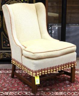 Appraisal: Moderne upholstered slipper chair having a winged back upholstered in