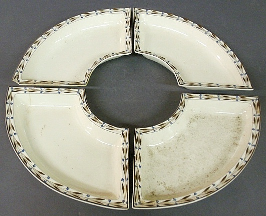 Appraisal: - Set of four English creamware crescent shaped dishes c