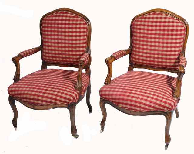 Appraisal: A PAIR OF LOUIS XV STYLE BEECH FRAMED FAUTEUILS with