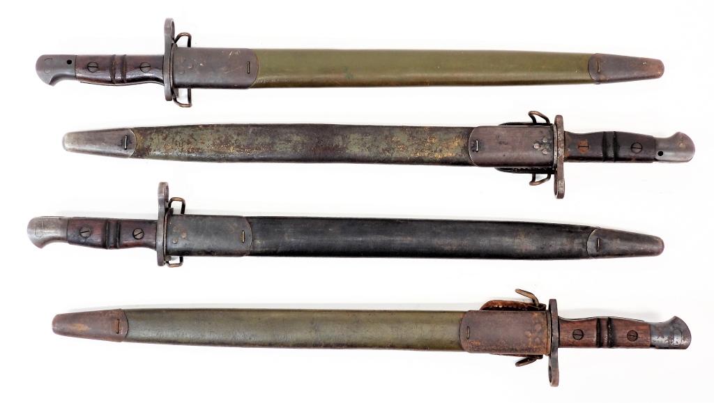 Appraisal: FOUR U S MODEL BAYONETS United states A Winchester-marked bayonet