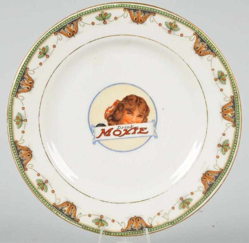 Appraisal: Drink Moxie China Dish Description Nice image of Moxie girl