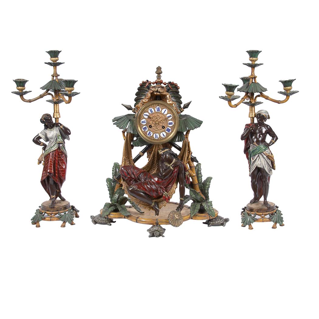 Appraisal: Cold Painted Metal Clock Garniture In the style of Bergman