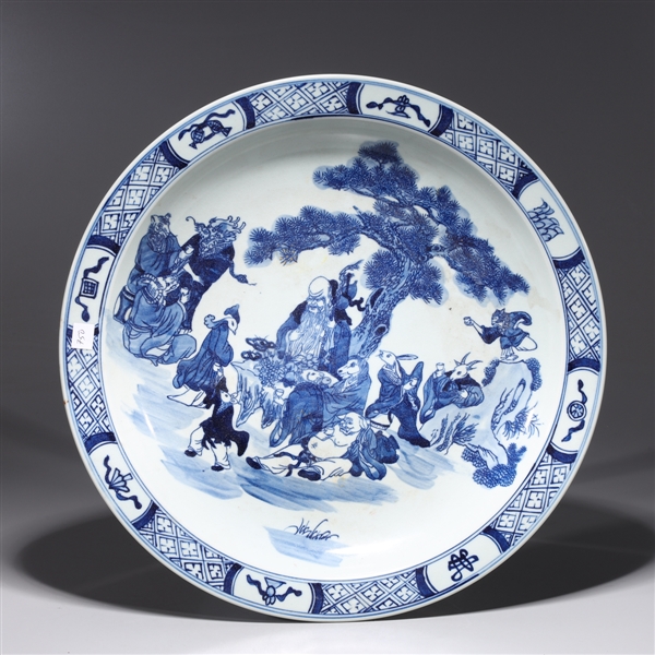 Appraisal: Chinese blue and white porcelain charger with feast scene showing