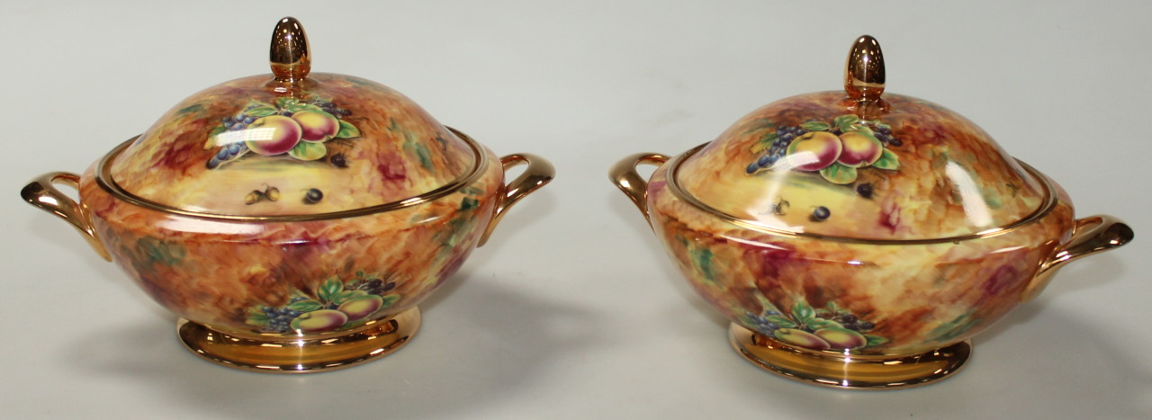 Appraisal: A pair of thC Baroness Pottery lidded tureens each with