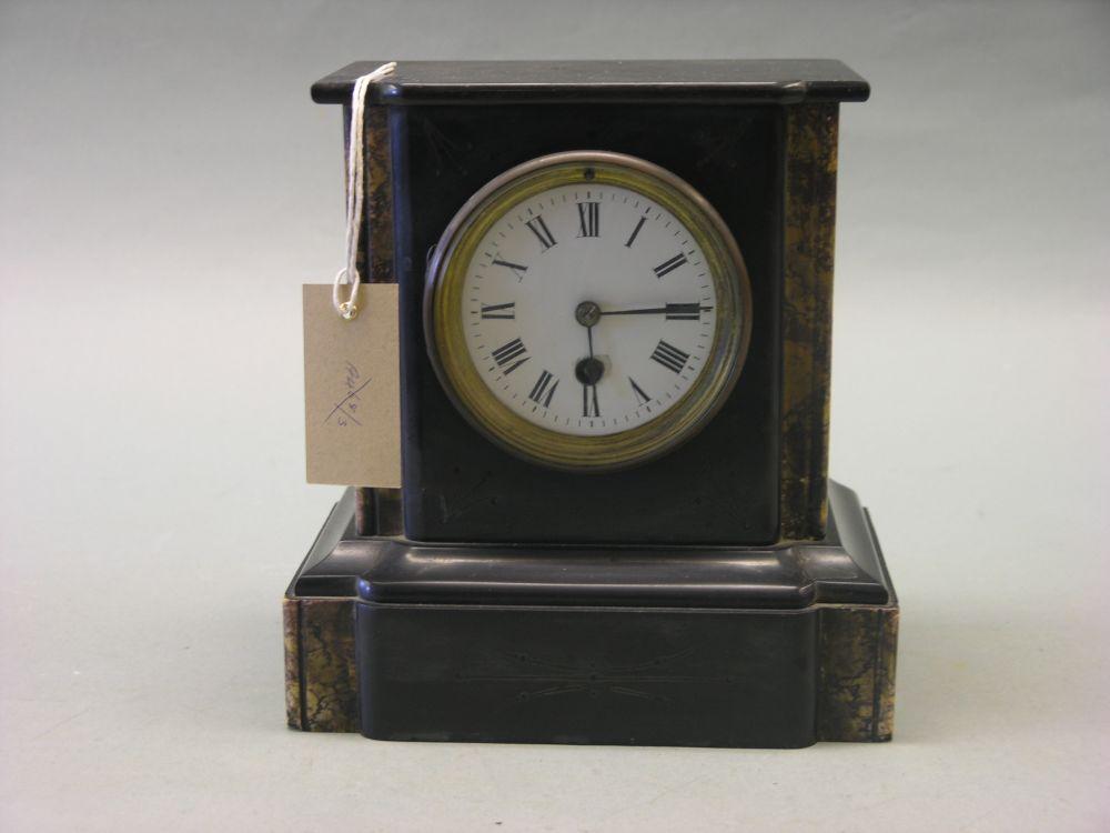 Appraisal: A Victorian black slate mantel clock with enamelled dial and