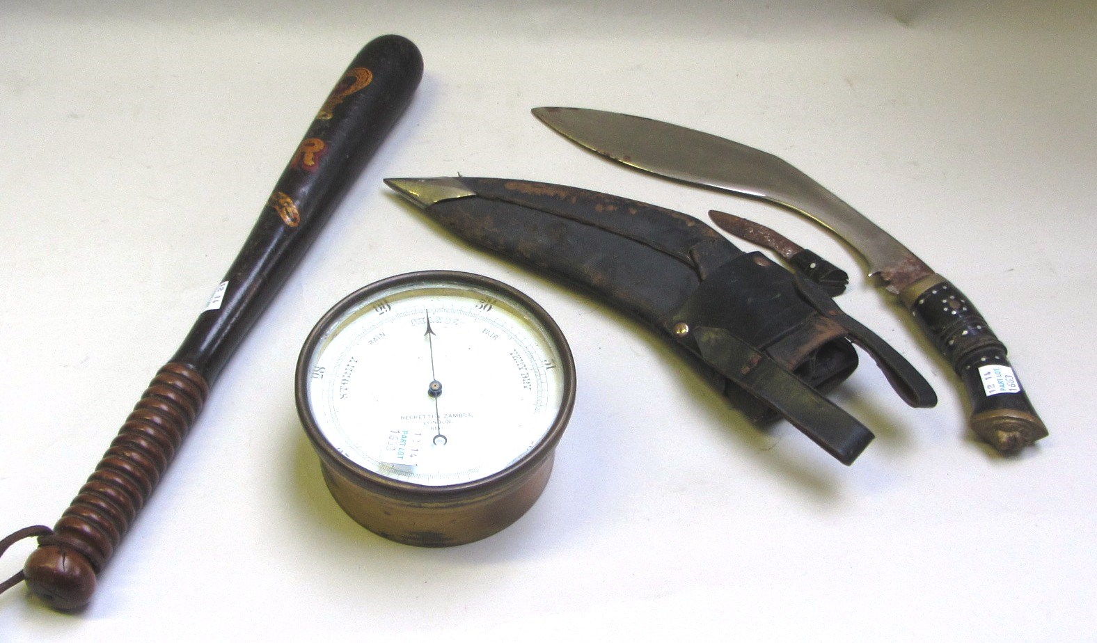 Appraisal: A quantity of metalware collectables including a brass cased barometer