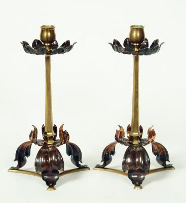 Appraisal: A PAIR OF ARTS CRAFTS BRASS AND ANODISED COPPER CANDLESTICKS