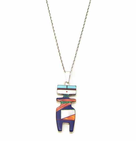 Appraisal: A Navajo Mosaic Pendant in the shape of a Kachina