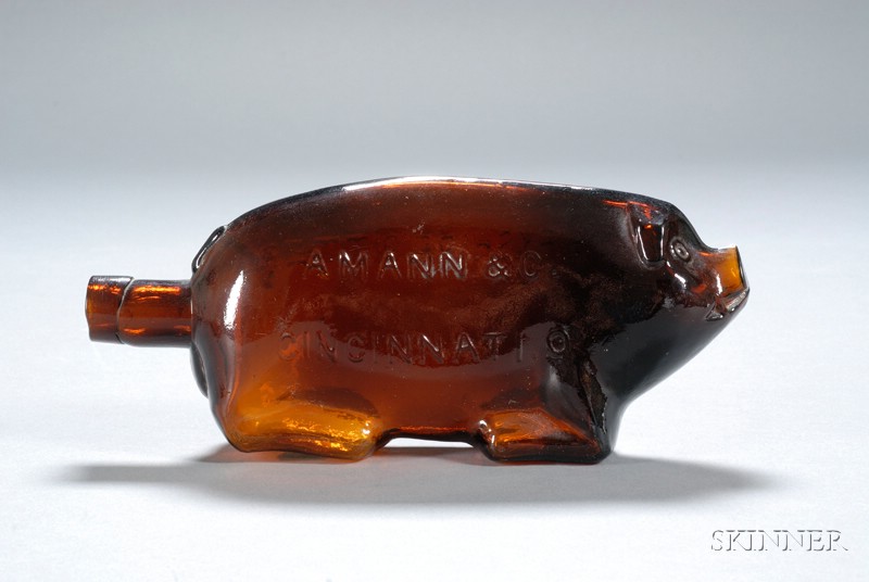 Appraisal: Dark Amber Berkshire Bitters Figural Glass Pig-form Flask Cincinnati Ohio