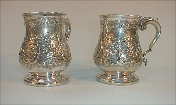 Appraisal: Two thC electroplate repousse baluster tankards inscribed for and North