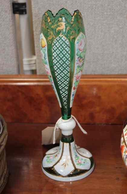 Appraisal: A BOHEMIAN GREEN GLASS VASE with gilt and floral decoration