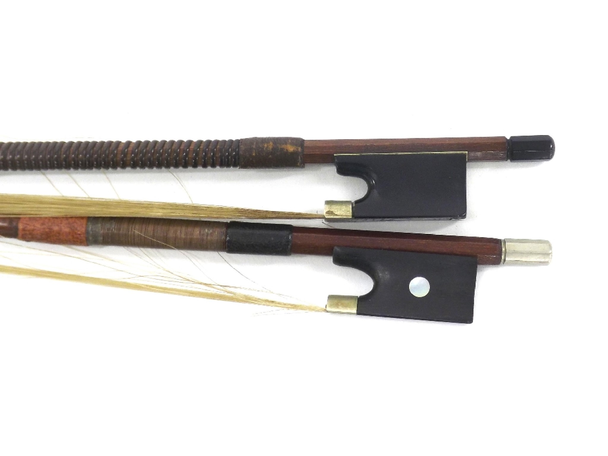 Appraisal: German nickel mounted violin bow stamped Adam Heinrich also another