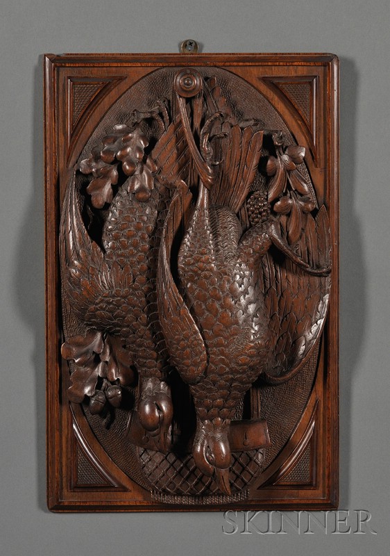 Appraisal: Two Relief-carved Walnut Panels with Hanging Game and Fish America