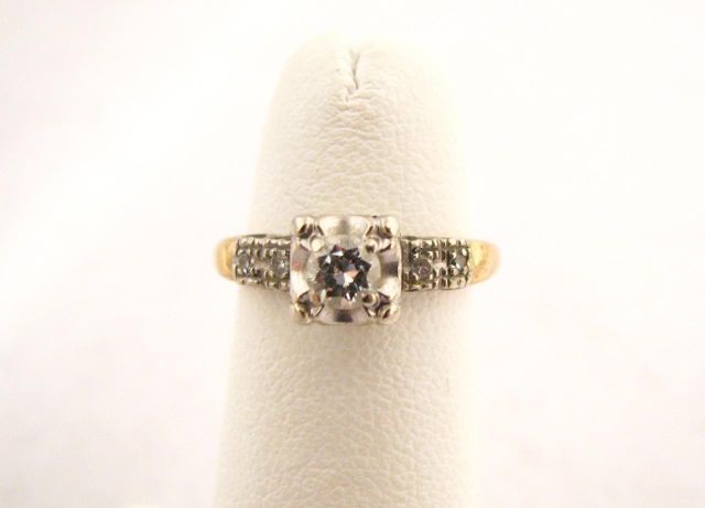 Appraisal: Lady's K yellow gold ring with approximately CT round center