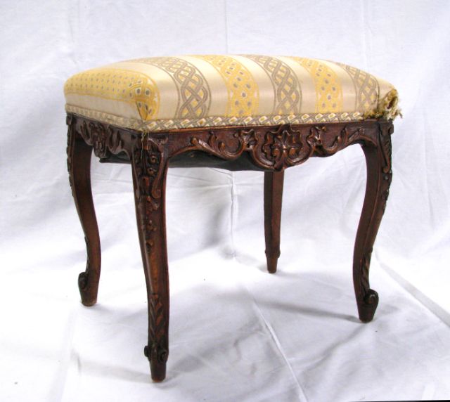 Appraisal: Decorative carved French Louis XV style bench with upholstered seat