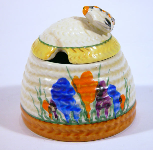 Appraisal: Clarice Cliff Bizarre beehive preserve pot and cover hand painted