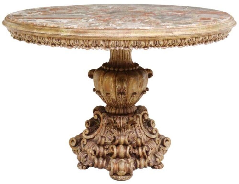 Appraisal: Baroque style center table having inset rounded marble top over