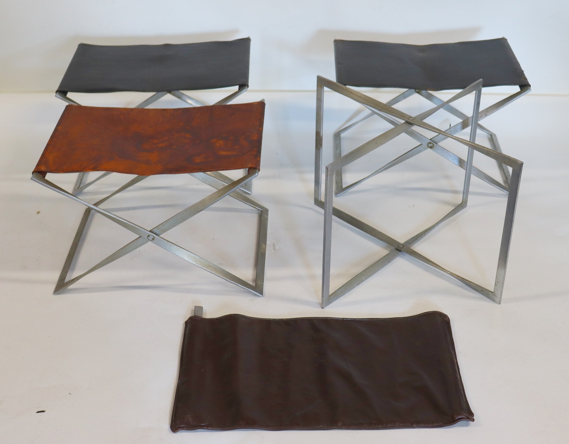 Appraisal: POUL KJAERHOLM - FOUR MIDCENTURY Folding Stools From a Stamford