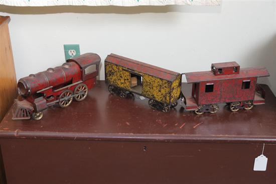 Appraisal: LARGE TIN TOY TRAIN Friction locomotive with one car and