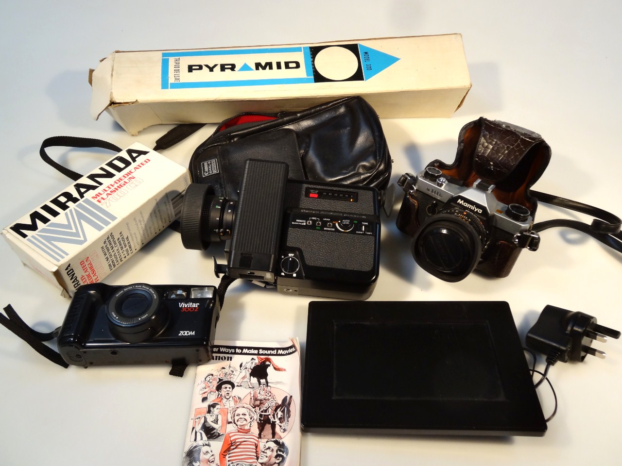 Appraisal: Various cameras equipment and other accessories to include a Canon