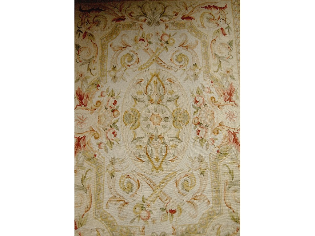 Appraisal: A contemporary handmade Aubusson rug of classical design on fawn