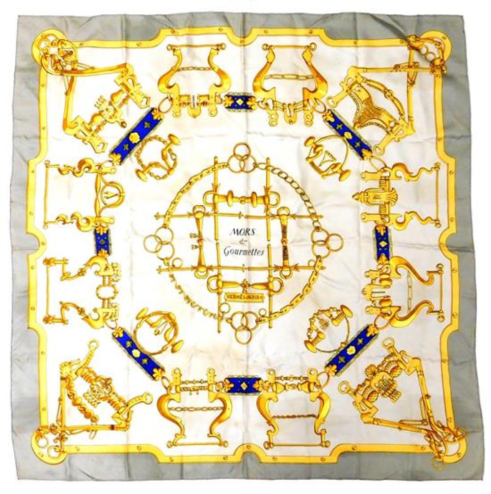 Appraisal: Herm s silk scarf in Mors Gourmettes gold metalwork jewelry