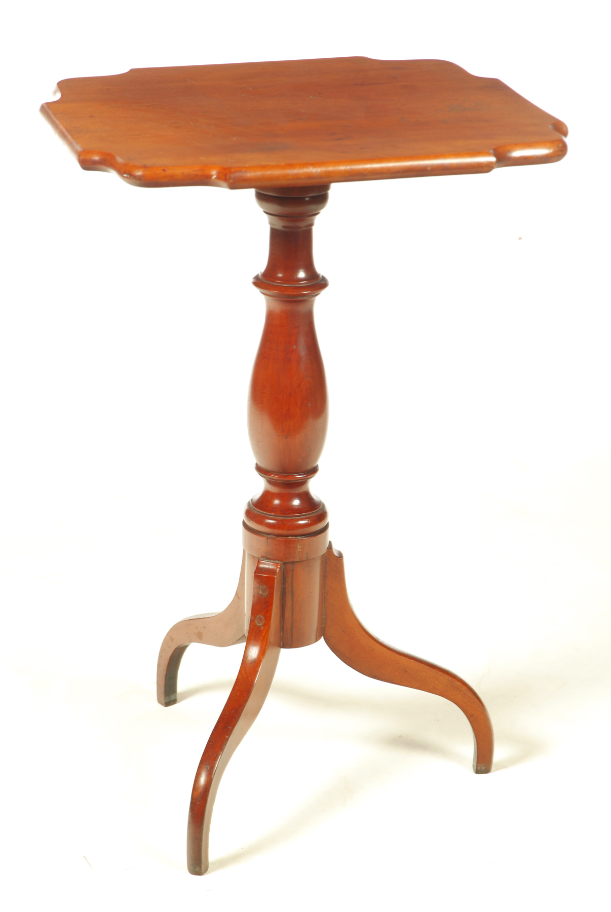 Appraisal: FEDERAL CANDLESTAND American early th century cherry Shaped tilt top