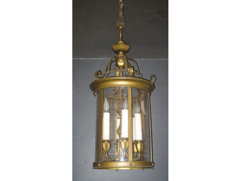 Appraisal: BRASS HANGING LIGHT FIXTURE Cylindrical six light fixture covered by