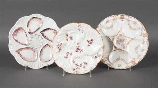 Appraisal: Two Limoges floral decorated porcelain oyster plates and a Continental