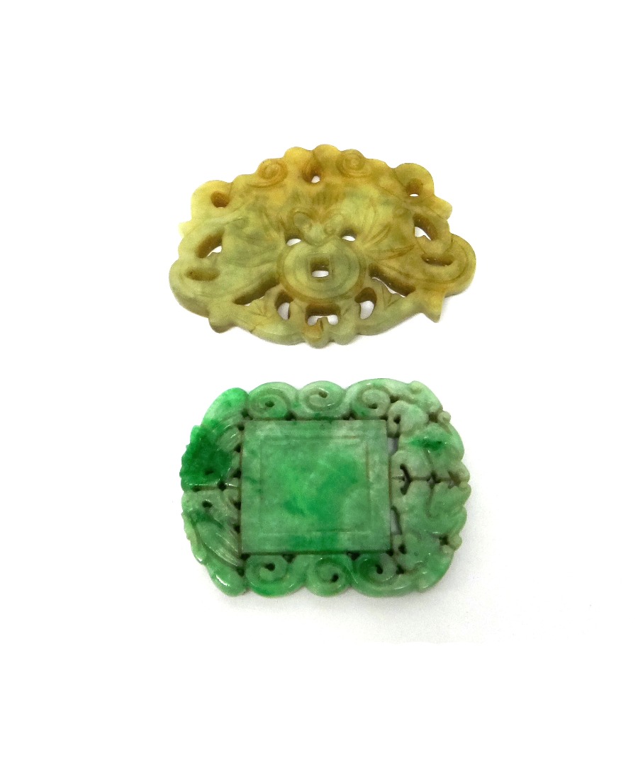 Appraisal: A Chinese jade carved pendant with a Dog of Fo