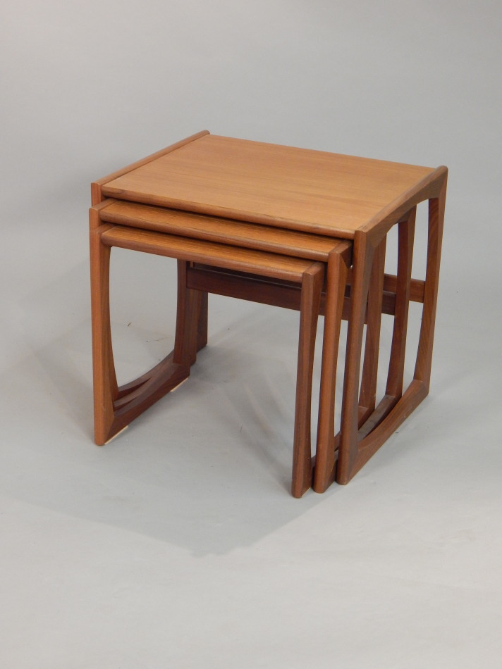 Appraisal: A nest of three Retro G-Plan teak tables each with