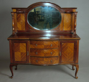 Appraisal: An early th century mahogany mirrorback sideboard the bevelled oval