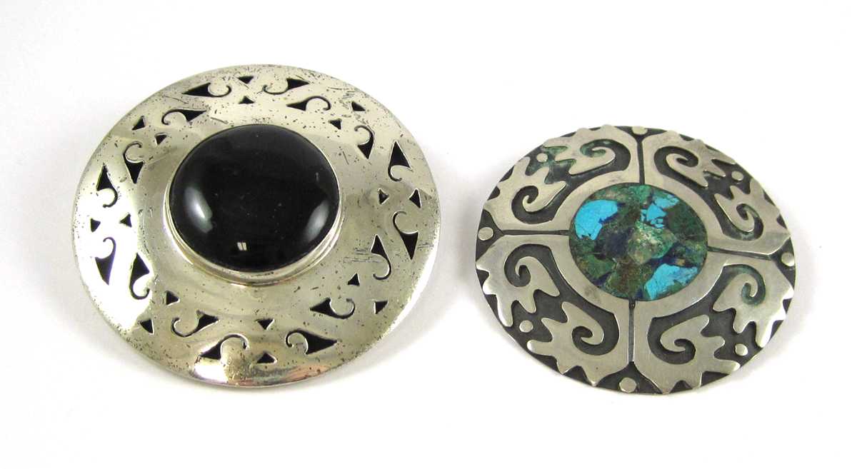 Appraisal: TWO MEXICAN STERLING SILVER PENDANT BROOCHES including a round sterling