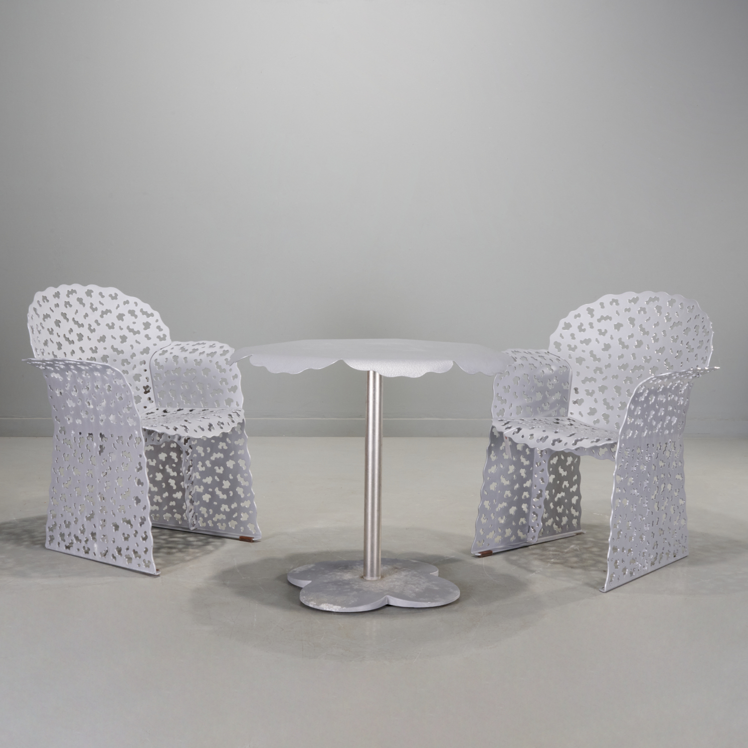 Appraisal: RICHARD SCHULTZ 'TOPIARY' CAFE TABLE AND CHAIRS c USA silver