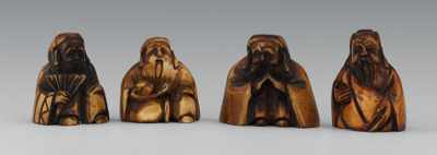 Appraisal: A Group of Four Carved Ivory Netsuke Containing four seated