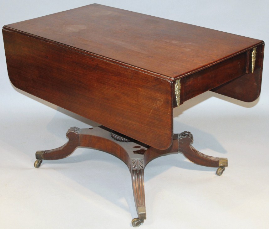 Appraisal: An early thC mahogany drop leaf sofa table the oblong