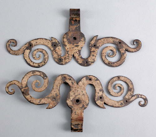 Appraisal: Pair of wrought iron ram's horn hinges th c w