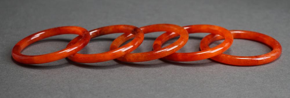 Appraisal: Five Red Jade Bangle Bracelets L approx in