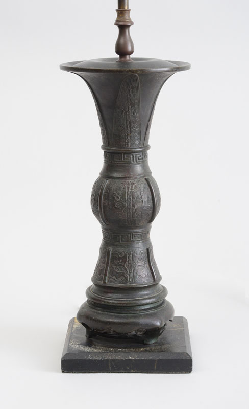 Appraisal: CHINESE ARCHAIC STYLE WINE VESSEL MOUNTED AS A LAMP Decorated