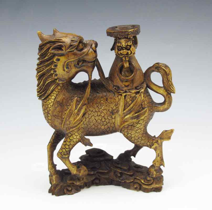 Appraisal: CHINESE MYTHOLOGICAL BUFFALO CARVED IVORY FIGURE Figural buffalo with hooves